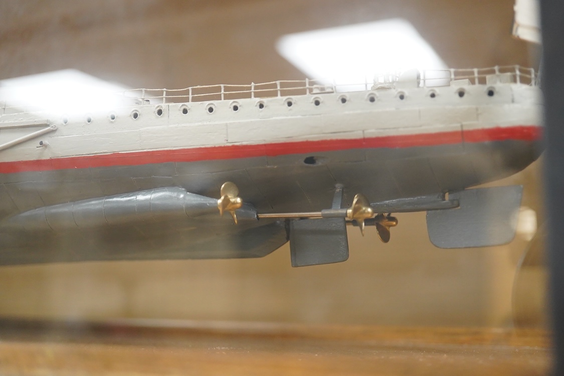 A cased Colin Freeman model of the German battle cruiser, S.M.S. Seydliyz, a well detailed model, with plaque describing the technical details and history regarding her involvement at the battle of Jutland, case 75 x 19.
